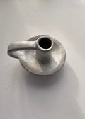 Ceramic candle holder on a light gray background